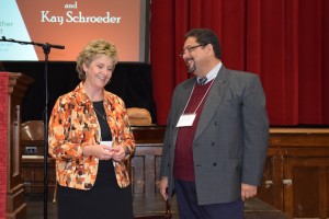 Kay Schroeder and Byron Pellecer lead worship on Friday evening.